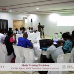 Participants engaged in media training workshop.